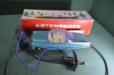 Машинка игрушка "Автомобиль с электродвигателем Кадиллак". Коробка. СССР. #U