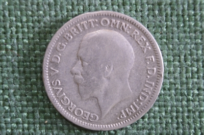 Монета 6 пенсов 1933 года. Six Pence. Серебро. Великобритания.