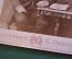 Фотография старинная "Семейная пара у столика с книгой". Фот. Ю. Мебиус. Москва.