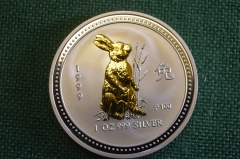 Монета 1 доллар 1999 год серебряная 1 унция. Позолота. Кролик лунар. Серебро 999 проба. Австралия