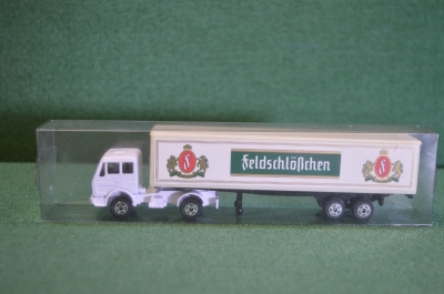Машинка, модель. Фура, грузовик. Пиво Feldschlosschen. Реклама.