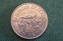 Монета 10 пенсов 1986 года. Ten Pence. Дольмены Ла-Пукелай-де-Фальдуэ. Джерси, Bailiwick of Jersey. 