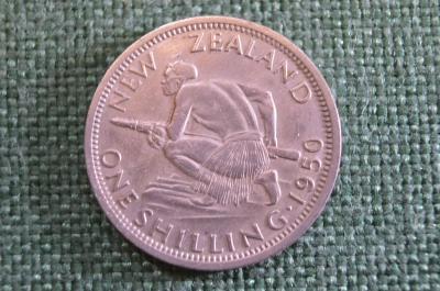 Монета 1 шиллинг 1950 года. One Shilling. Туземец с копьем. Георг VI. New Zealand. Новая Зеландия.